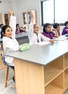 students in a lab at Adani international School